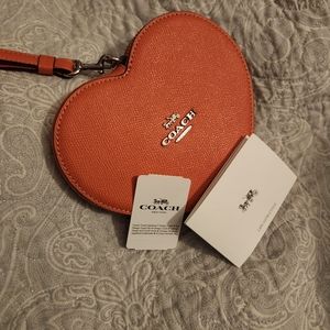 Pink heart shaped coach wristlet wallet purse